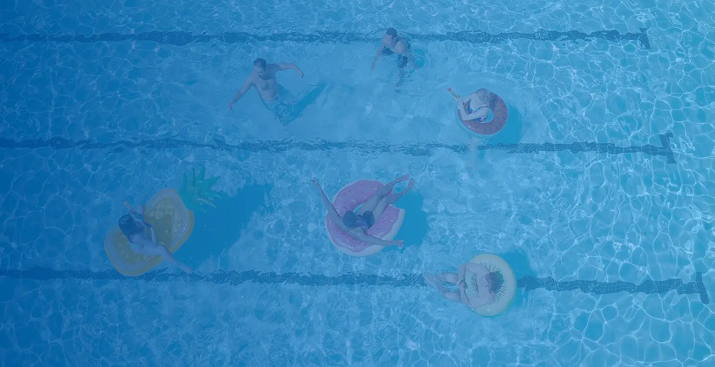 Pool water with swimmers
